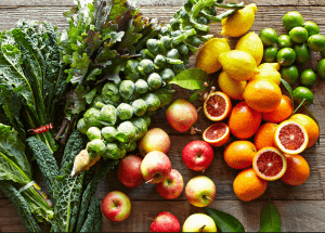 a group of fruits and vegetables on a wood surface Healthy Weight Loss Diets Haslemere